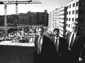 Photograph: Research by FDIC staff, including (l to r) senior financial analyst Thomas Murray, senior analyst Charles Collier and economist Daniel Nuxoll, identifies potential risks to banks and cities from commercial real estate development.
