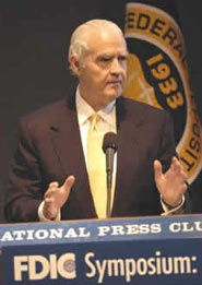 FDIC Chairman Don Powell describes the background and accomplishments of the luncheon speaker, The Hon. Michael G. Oxley (R-OH), Chairman of the Committee on Financial Services.(Photo: James Kegley)