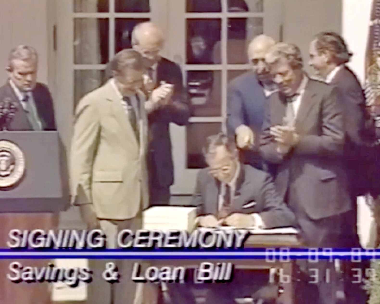 President George H. W. Bush signs the Financial Institutions Reform