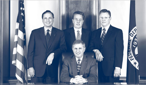 Acting Chairman Martin J. Gruenberg (seated), John C. Dugan, Thomas J. Curry, and John M. Reich (standing, l eft to right)