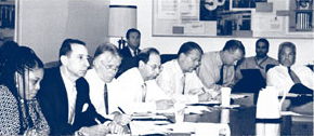 DRR Director Mitchell Glassman, second from left, chairs a meeting of the Hurricane Task Force at Washington Headquarters.