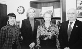 Photograph: George Hanc (right), Chair of the Research Committee supporting the Working Group on Deposit Insurance--comprising representatives from 12 countries, the International Monetary Fund and The World Bank--and committee members (l to r) Rose Kushmeider, Christine Blair and Detta Voesar.