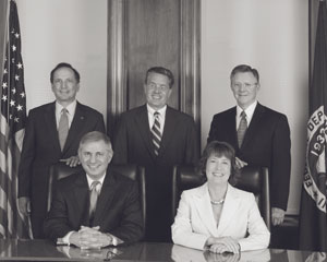 FDIC Board of Directors: Martin J. Gruenberg, Sheila C. Bair, Chairman (seated),  John C. Dugan, Thomas J. Curry, and John M. Reich (standing, left to right)  