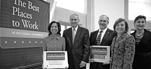 FDIC Acting Chairman Martin J. Gruenberg accepting the awards on behalf of the agency