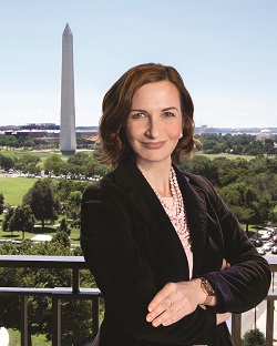 Portrait of Jelena McWilliams with the Washington Monument in the background