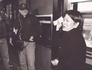 Chairman Tanoue appeared on live network television to withdraw cash from an ATM, showing it was business as usual for bank customer on January 1, 2000.