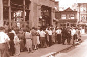 Picture of a line of people at a bank closing circa 1935