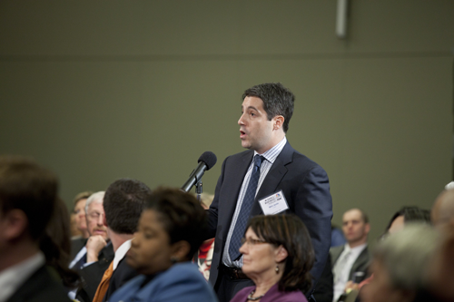 An audience member asks a question during the second panel of the FDIC's Overcoming Obstacles to Small Business Lending Forum.