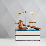 Image of scales, gavel, and books