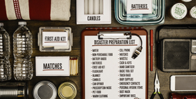 A disaster emergency kit and list, with all of the immediate necessities pictured and listed